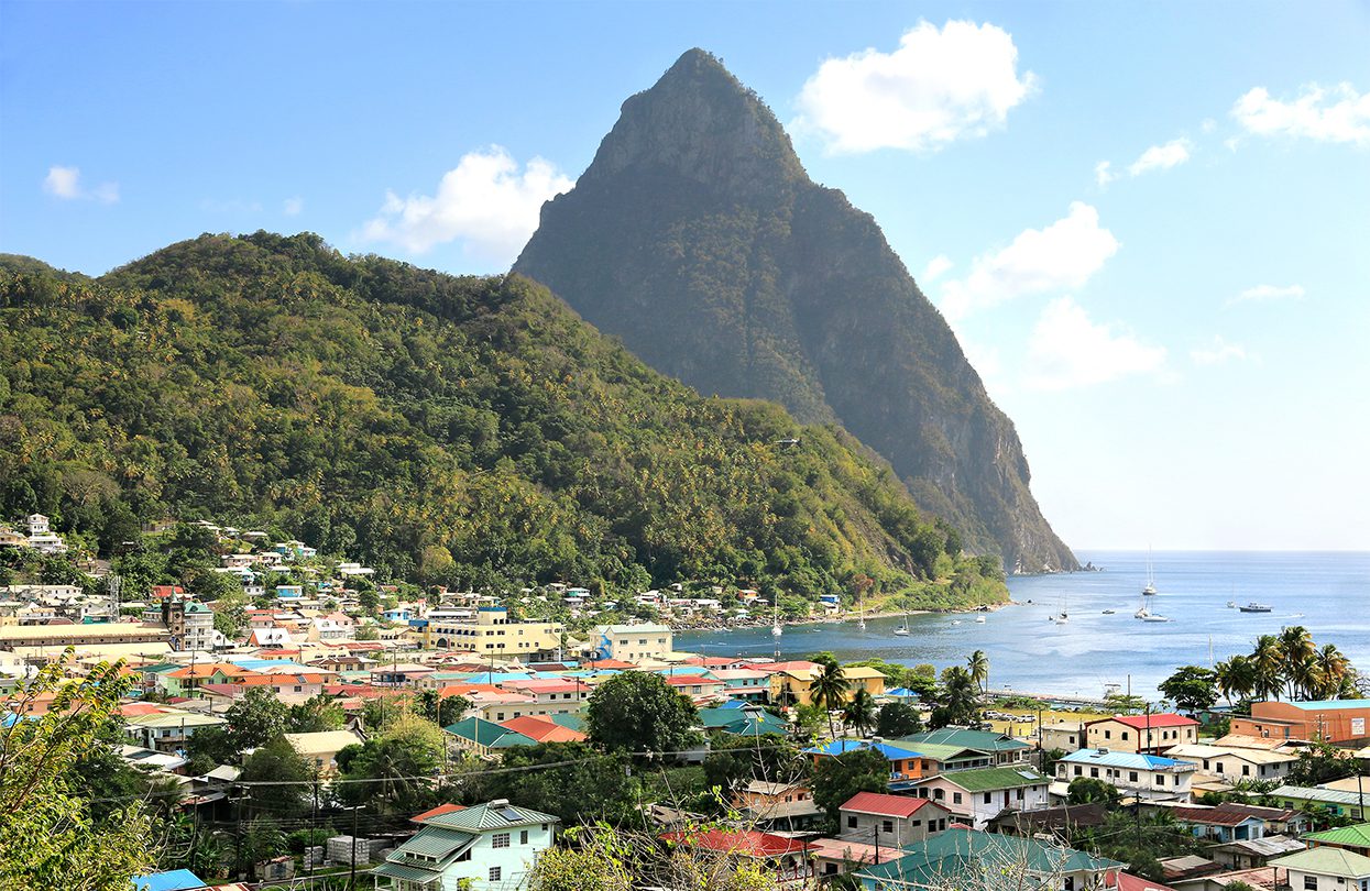 The town of Soufriere on the island of Saint Lucia is very popular for travelers because of the breathtaking views of the Piton mountains, image by Inga Locmele