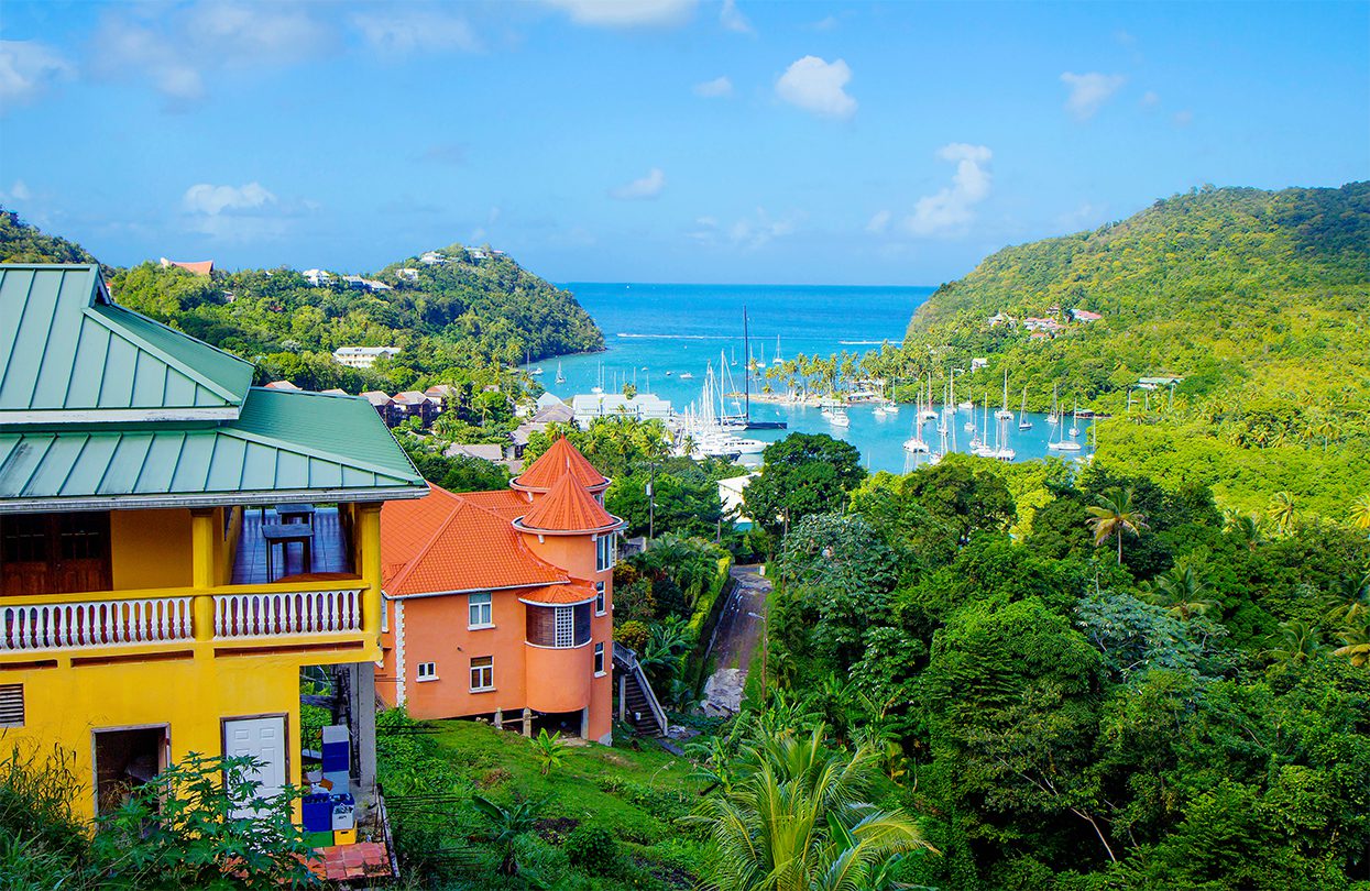 Yachts in the harbor on the island of St. Lucia, a Caribbean getaway in the Windward Islands that has long been popular with sailors and snowbirds alike, image by Galina Savina