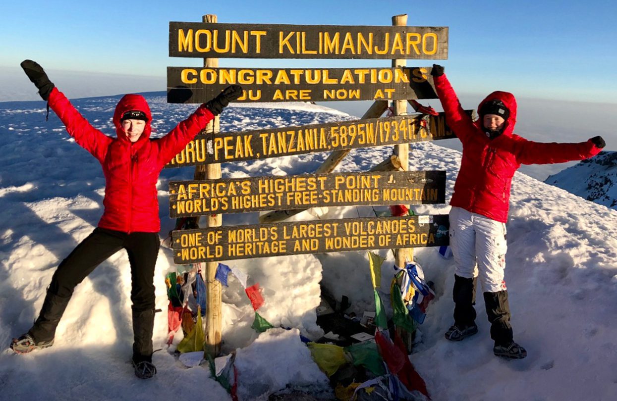 Paige Parker at the top of Mount Kilimanjaro with her daughter Happy