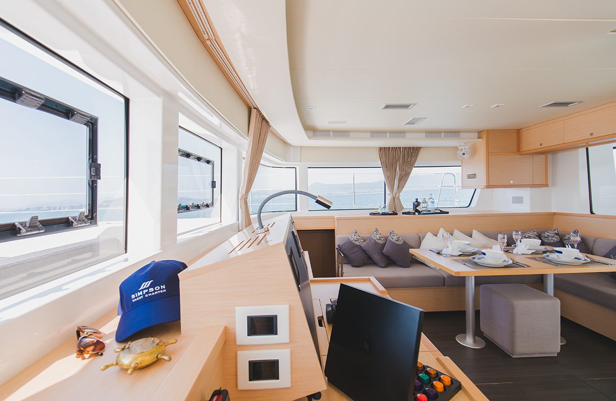 The interior of the Blue Moon catamaran comes with vertical windows in the salon which creates a spacious environment to lounge, Photo - Wan Tse, Simpson Yacht Charter