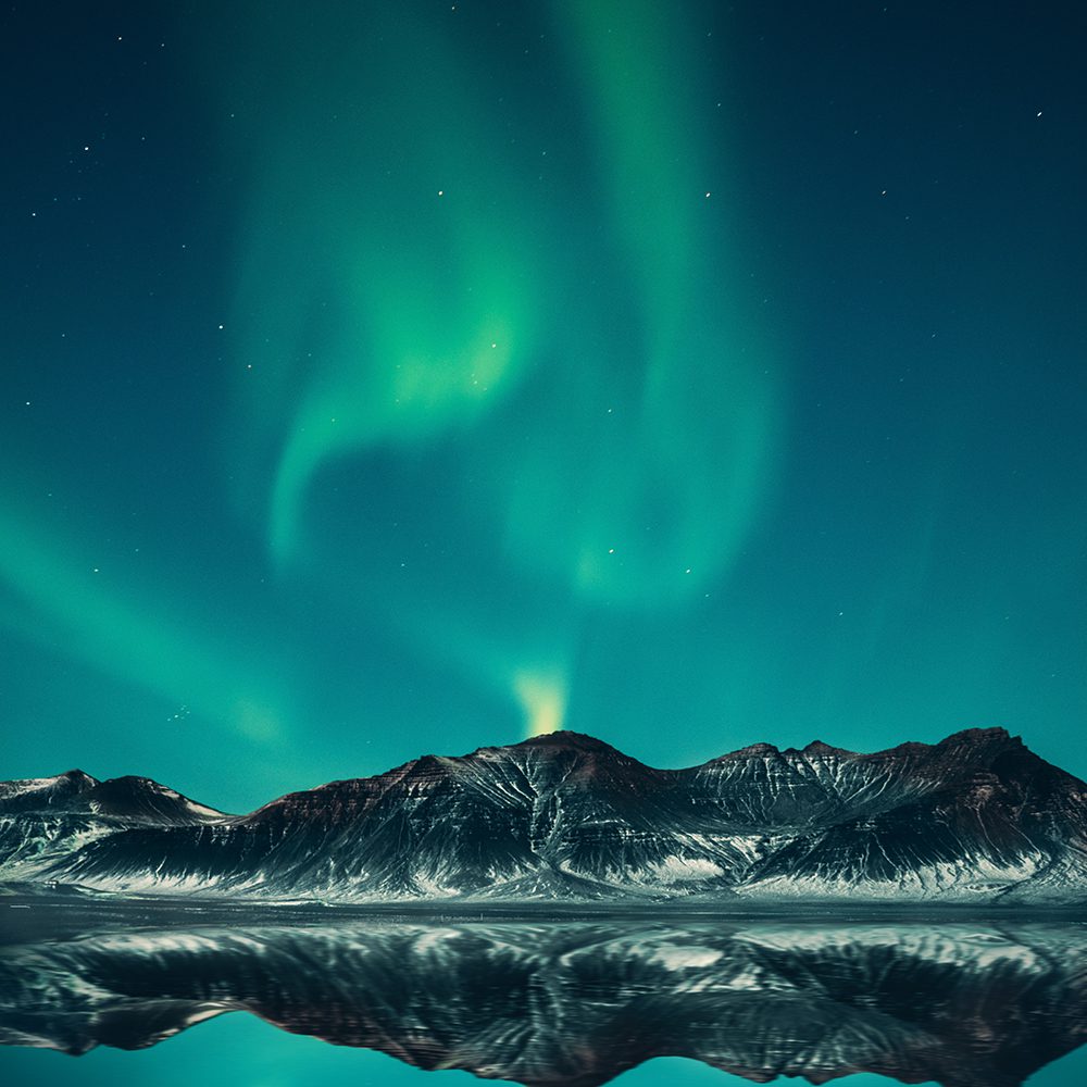 Blue and Green Sky and Mountain, photo by Benjamin Suter from Pexels