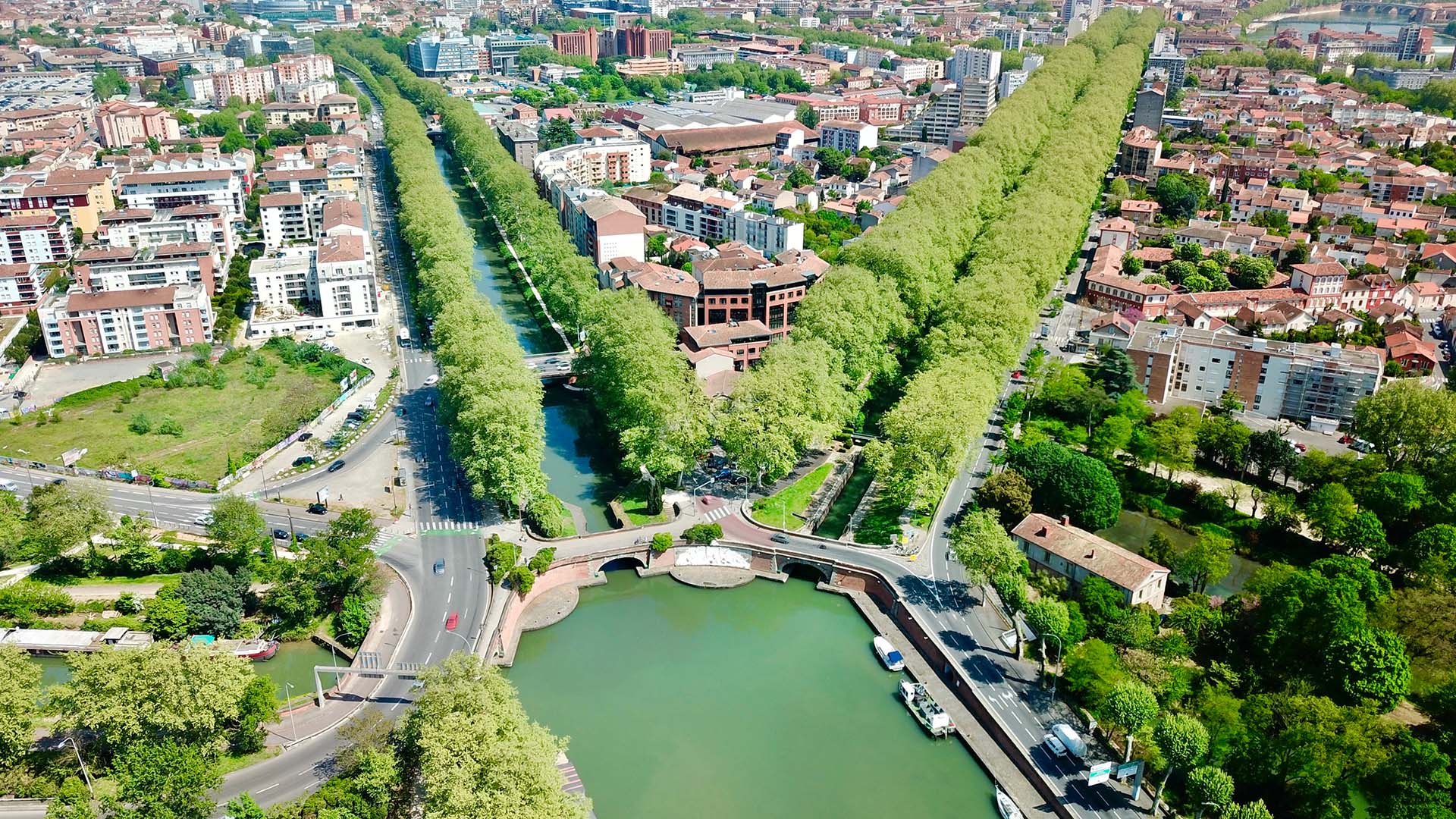 The Canal du Midi, the twin bridges and the port of the embourure in Toulouse in France, Photo by Colibri Vision, Shutterstock