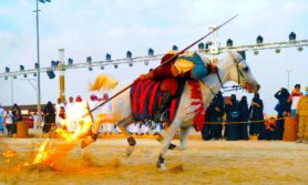 Horseman performs with a lance at the Souk Okaz in Taif, July 2017