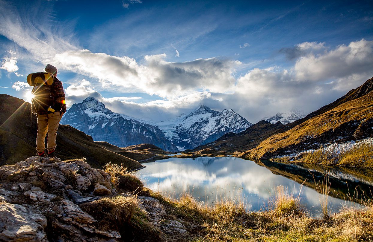 Hiking along the Lake Bachalp, image copyright Jungfrau Region Tourismus AG