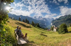 Hiking along the Kleine Scheidegg - Wengen Trail, image copyright Jungfrau Region Tourismus AG