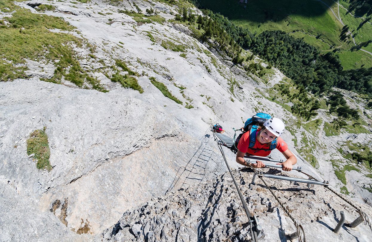 A via ferrata is a climbing route that often includes iron steps bored into rock face, image by Switzerland Tourism