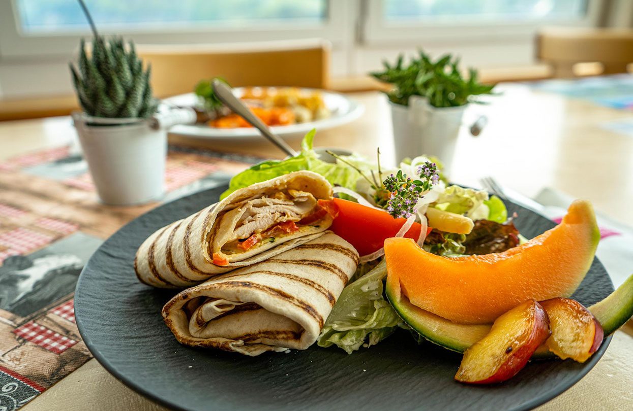 Snack on healthy wraps, salads, melted cheese sandwiches, fruits and other vegan and vegetarian options when at Allmendhubel Panorama Restaurant, image by Switzerland Tourism