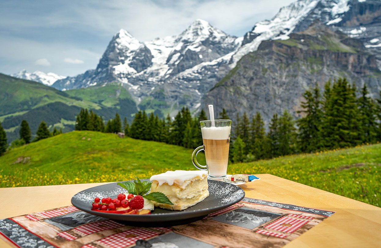 A quick snack at Allmendhubel Panorama Restaurant in between taking in the spectacular views of the Swiss Alps, image by Switzerland Tourism