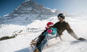 Sledging on the Eiger Run during the day, image by Jungfrau Railways, Switzerland Tourism