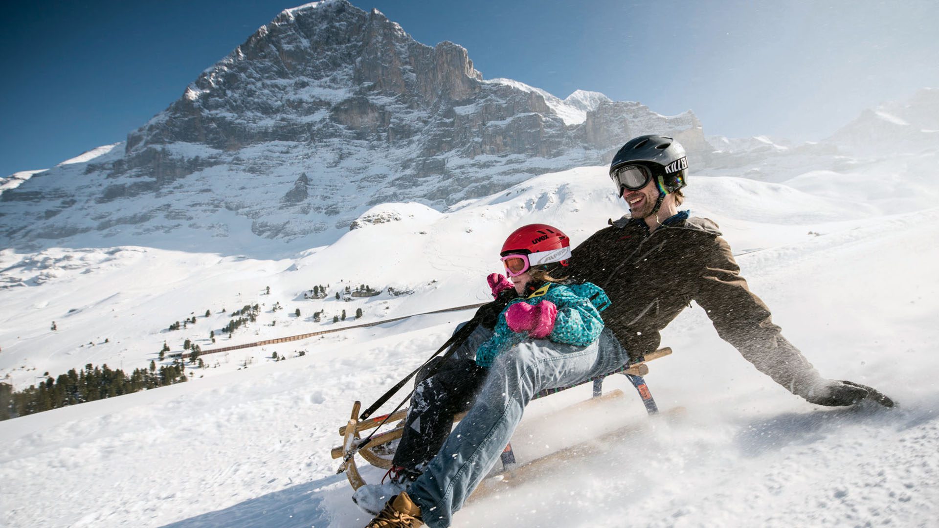 Sledging on the Eiger Run during the day, image by Jungfrau Railways, Switzerland Tourism