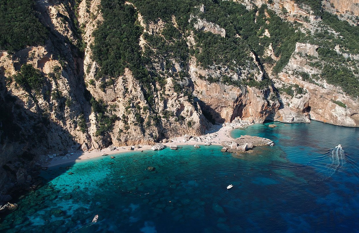 One of the most beautiful secret beaches in Sardinia - Cala Mariolu, Photo by Leon Rohrwild on Unsplash