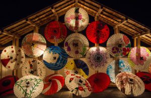 Illuminated Japanese umbrellas on display, Image by Kohji Asakawa from Pixabay