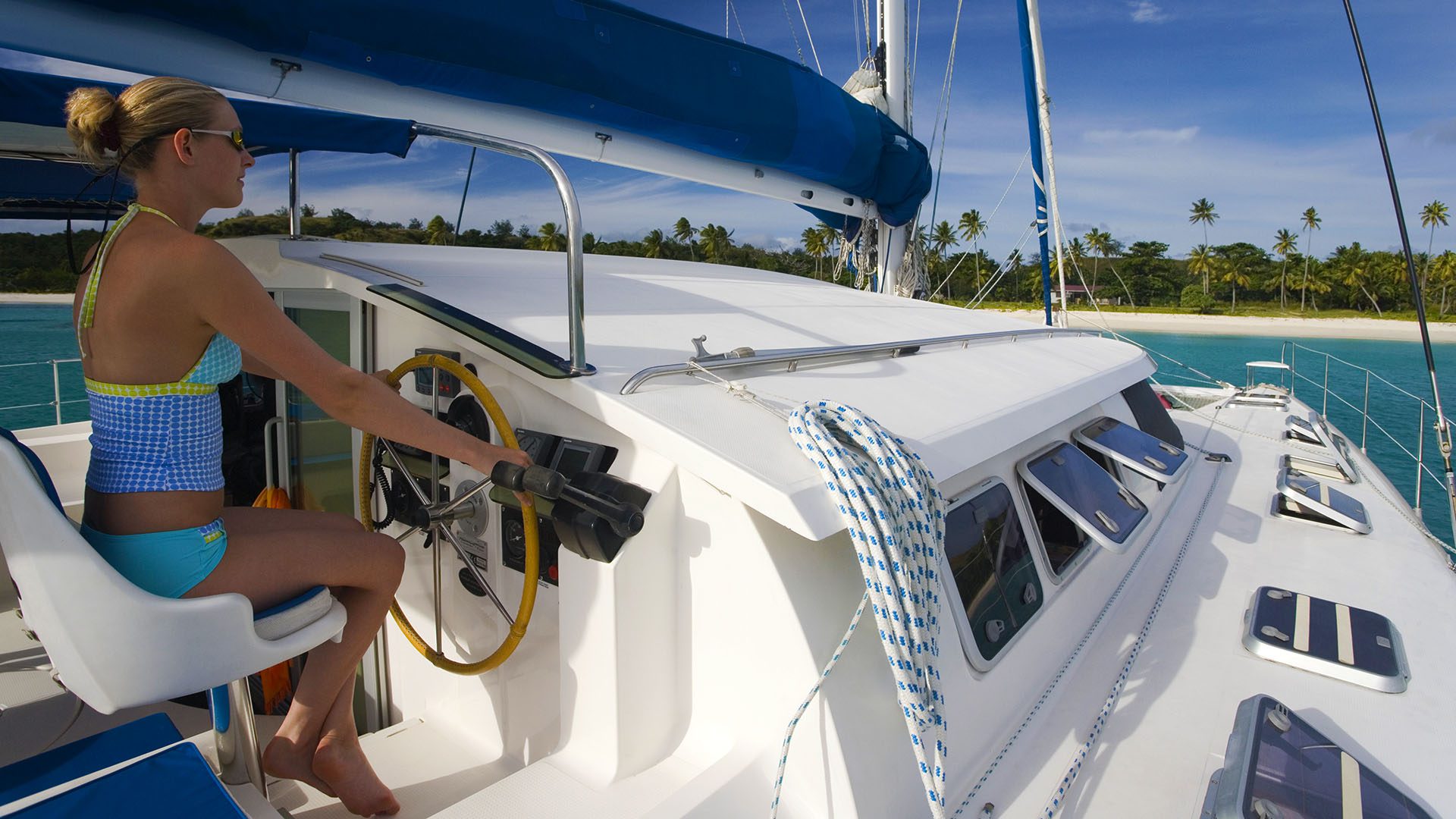Catamaran off the coast of Fiji, Image by Steve Allen, Shutterstock