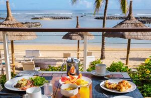 Breakfast at a tropical beach in Mauritius, Image by fokke baarssen, Shutterstock