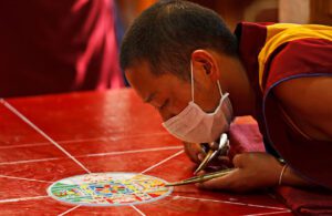 Buddhist monks making sand mandala in McLeod Ganj, Image by Dmitry Rukhlenko, Shutterstock