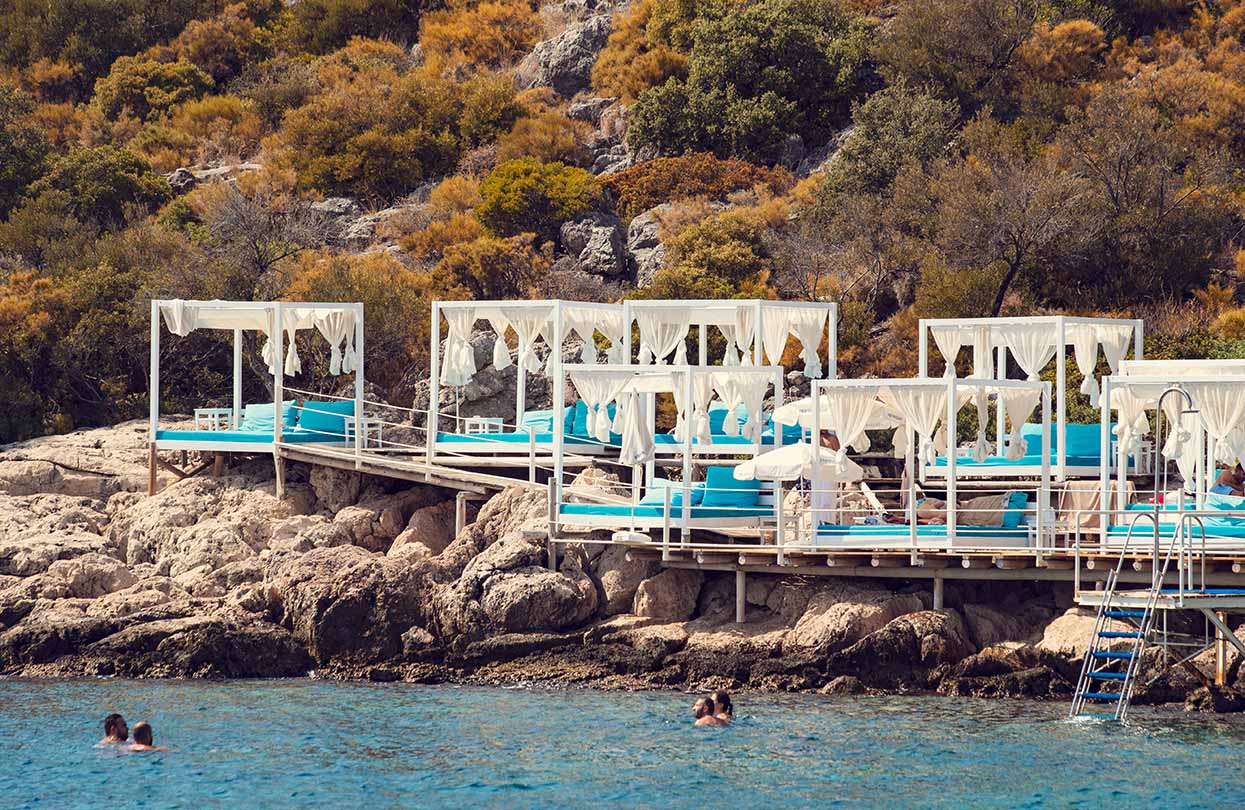 Chill out cafe and sun beds by the sea in Kas, Image by Sun_Shine, shutterstock