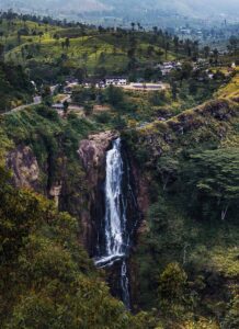 Waterfall among the tea plantations of the country of Sri Lanka, Image by Dudarev Mikhail, shutterstock