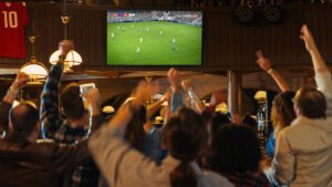 Football match in El Born, image by Gorodenkoff, Shutterstock